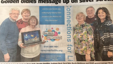 Stay Mobile Stay Connected campaigners photographed for news story
